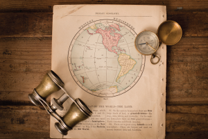 Image of vintage map, compass, and binoculars. Image of vintage map, compass, and binoculars.